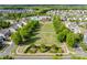 Aerial view of the community showcasing green space and a pool area at 5070 Saint Clair St, Fort Mill, SC 29715