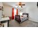 Charming bedroom with a wood bed frame, a window, and a desk, designed for comfort at 5070 Saint Clair St, Fort Mill, SC 29715