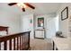 Well-lit bedroom offering a quaint design with a wooden bed frame and neutral colored carpet flooring at 5070 Saint Clair St, Fort Mill, SC 29715