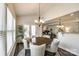 Inviting dining area with hardwood floors and an open view to the kitchen at 5070 Saint Clair St, Fort Mill, SC 29715