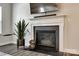 Fireplace with plant and decoration at 5070 Saint Clair St, Fort Mill, SC 29715
