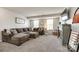 Cozy living room features plush seating, a TV, and a fireplace creating a relaxing atmosphere at 5070 Saint Clair St, Fort Mill, SC 29715