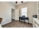 A versatile home office space with a piano, perfect for both work and creative pursuits at 5070 Saint Clair St, Fort Mill, SC 29715