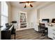 Bright office with a built-in bookshelf, a desk, and a piano perfect for working from home at 5070 Saint Clair St, Fort Mill, SC 29715
