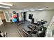 Well-equipped exercise room featuring treadmills, weights, and various fitness machines at 525 N Graham St, Charlotte, NC 28202