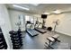 Well-equipped exercise room featuring treadmills, weights, and various fitness machines at 525 N Graham St, Charlotte, NC 28202