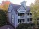 Charming two-story condominium with balconies and professionally landscaped grounds at 525 N Graham St, Charlotte, NC 28202