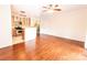 Spacious living room with hardwood floors leading to the kitchen at 525 N Graham St, Charlotte, NC 28202