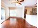 Hardwood floors throughout the living room with sliding door access to patio at 525 N Graham St, Charlotte, NC 28202
