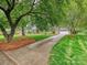 Charming single Gathering home with a lush front lawn and long driveway to a 2-car garage at 5624 Warewhip Ln, Charlotte, NC 28210
