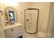 Bathroom with a modern vanity and walk-in shower at 62 Fourth St, Cramerton, NC 28032
