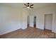 Spacious bedroom featuring a ceiling fan, closet, and recessed lighting at 62 Fourth St, Cramerton, NC 28032