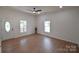 Light and airy living room with new flooring and natural light at 62 Fourth St, Cramerton, NC 28032