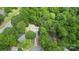 Discover this secluded home nestled amidst lush greenery and mature trees, offering privacy and serenity at 6736 Raeburn Ln, Charlotte, NC 28227