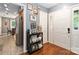 Spacious foyer with hardwood floors, decoratives and access to kitchen and living area at 6736 Raeburn Ln, Charlotte, NC 28227