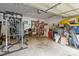 Spacious garage with ample storage and equipment, ready for your projects and vehicles at 6736 Raeburn Ln, Charlotte, NC 28227