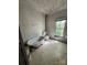 Bathroom featuring a claw foot tub and vintage fixtures by the window at 723 Pee Dee Ave, Albemarle, NC 28001