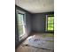 Corner bedroom featuring natural light from two windows at 723 Pee Dee Ave, Albemarle, NC 28001