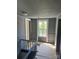Hallway with gray painted paneling, a light fixture and staircase at 723 Pee Dee Ave, Albemarle, NC 28001