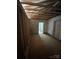 Unfinished room with exposed studs and visible doorway at 723 Pee Dee Ave, Albemarle, NC 28001