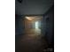 An unfinished interior shows a framed section and sunlight streaming through the doorway at 723 Pee Dee Ave, Albemarle, NC 28001