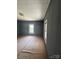 A room with modern windows and flooring covered in brown paper at 723 Pee Dee Ave, Albemarle, NC 28001