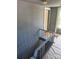 Gray painted staircase with painted walls and paneling at 723 Pee Dee Ave, Albemarle, NC 28001