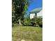 Lush green lawn and mature landscaping surround this beautiful home at 723 Pee Dee Ave, Albemarle, NC 28001