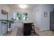 Bright kitchen has tiled floors, an island with seating, and a sign on the wall at 744 Chipmeadow Ln, York, SC 29745