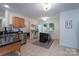 Bright kitchen features stainless steel appliances, tiled floors, and an island with seating at 744 Chipmeadow Ln, York, SC 29745