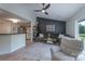 Open-concept living space featuring a cozy seating area and views into the adjoining kitchen at 744 Chipmeadow Ln, York, SC 29745