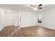 Inviting living room with stylish floors, neutral walls, and ample natural light at 7616 Monarch Birch Ln, Charlotte, NC 28215