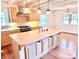 Bright kitchen with a large island, modern appliances, and great lighting for cooking at 7811 Babe Stillwell Farm Rd, Huntersville, NC 28078