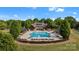 Stunning community pool featuring a large pool with ample seating and luxurious clubhouse at 7906 Skye Lochs Dr, Waxhaw, NC 28173