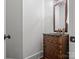 Stylish powder room with elegant fixtures and vanity at 7906 Skye Lochs Dr, Waxhaw, NC 28173
