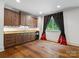 Spacious wet bar features custom cabinets and granite countertops at 7906 Skye Lochs Dr, Waxhaw, NC 28173