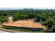 A beautiful view of building land with a city skyline in the background and a dense green forest at 808 Garringer Pl, Charlotte, NC 28208