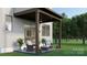 Relaxing outdoor patio with comfortable seating, a ceiling fan, and view of the landscaped backyard at 808 Garringer Pl, Charlotte, NC 28208