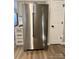 Stainless steel refrigerator is in a kitchen featuring granite countertops and subway tile at 8809 Reedy Creek Rd, Charlotte, NC 28215