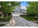 Charming two-story home features a well-maintained lawn and a two-car garage at 9414 Seamill Rd, Charlotte, NC 28278