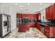 Modern kitchen boasts granite countertops, stainless steel appliances, and a center island at 9414 Seamill Rd, Charlotte, NC 28278