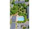 Beautiful community pool with lounge chairs and mature trees surrounding the area at 1006 Phil Oneil Dr, Charlotte, NC 28215