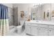 Clean bathroom featuring a shower and a vanity with white cabinets at 1006 Phil Oneil Dr, Charlotte, NC 28215