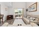 Bright living room with a sliding glass door, providing access to the outdoor space at 1006 Phil Oneil Dr, Charlotte, NC 28215