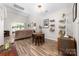 View of spacious living room that flows to the outdoor patio area at 1006 Phil Oneil Dr, Charlotte, NC 28215