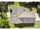 Aerial view showing a well-maintained home's roof with mature lawn and the property's surrounding landscaping at 10330 Seedling Ln, Charlotte, NC 28214