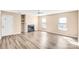 Spacious living room featuring a fireplace and new floors at 10330 Seedling Ln, Charlotte, NC 28214