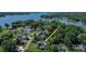 Aerial view of property with lake access, surrounded by lush greenery at 106 Chatworth Ln, Mooresville, NC 28117