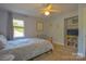 Bedroom with carpet, light blue walls, and natural light from the window at 106 Chatworth Ln, Mooresville, NC 28117
