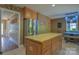 Well-appointed kitchen featuring stainless steel appliances and a center island with a granite countertop at 106 Chatworth Ln, Mooresville, NC 28117